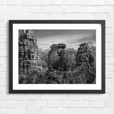 Listing image for Khmer Ancient Temple Faces Sunset Sky Black & White Framed Wall Art Print Large