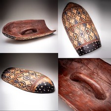 Listing image for West African Carved Wooden Ceremonial Shield Wall Art Mid 20th Century 58cm Tall