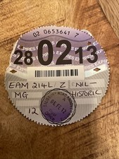 Listing image for Historical MG Tax Disc Tax Disc February 2013 Nil Cost Vintage Car Memorabilia